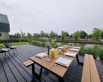 Luxury villa with private terrace on the water - Balk - Patio