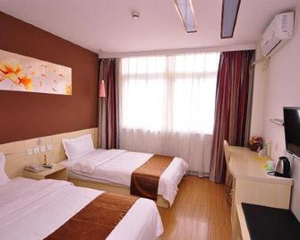 Thank Inn Chain Hotel Shandong Dezhou Ningjin Zhengyang Road Xinhua Building - Dezhou - Slaapkamer