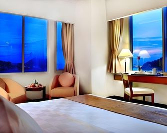 Aston Jayapura Hotel and Convention Center - Jayapura - Bedroom