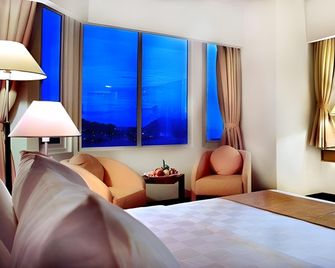 Aston Jayapura Hotel and Convention Center - Jayapura - Schlafzimmer
