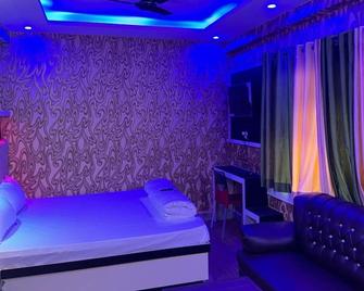 هوتل ريلاكس زون - باتنا - غرفة نوم