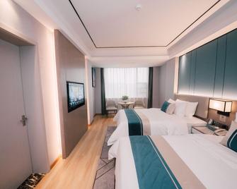 Wusheng International Hotel - Loudi - Bedroom