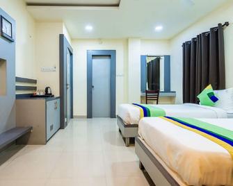 Treebo Udyam Glory - Nagpur - Habitación