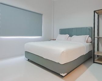 RedDoorz Plus near Siloam Hospital Balikpapan - Balikpapan - Ložnice