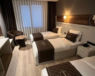Roccia Downtown Otel - Ван - Спальня
