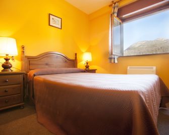 Pension Monteverde - קאנגאס דה אוניס - חדר שינה