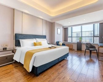 Ganzhou Xiangjiang International Hotel (Da Vinci Vientiane City Branch) - Ganzhou - Bedroom
