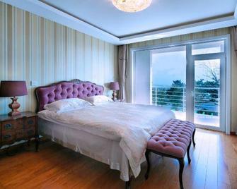 Qingdao Oceanside Hotel & Resort - Qingdao - Habitación