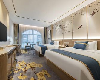 Xinyangfeng Hotel (Jingmen Railway Station Branch) - Jingmen - Habitación