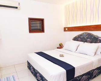 Hotel Olympic Semarang by Sajiwa - 三寶瓏(市) - 臥室