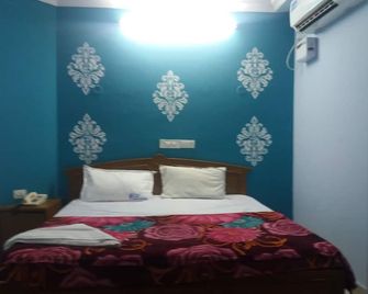 Krishnagrandinn - Guntūr - Bedroom