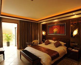 Beihai Seaview Caiyun Hotel (Qiaogang Beach Qiaogang Fengqing Street) - Beihai - Slaapkamer
