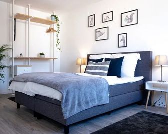 هيلز ديزاين أبارتومو آن دير ميسي - ايسن - غرفة نوم