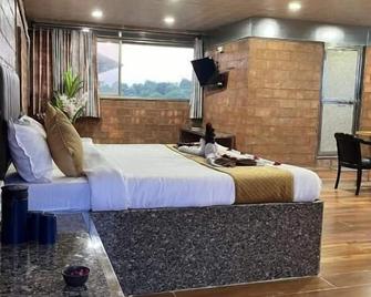 Shri Shiv Villa Resort By Bd Hospitality - Sasan Gir - Bedroom