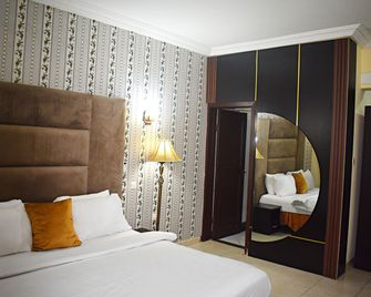 Davis Hotels And Suites - Port Harcourt - Schlafzimmer