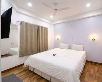 Hotel The White House Varanasi - Varanasi - Κρεβατοκάμαρα