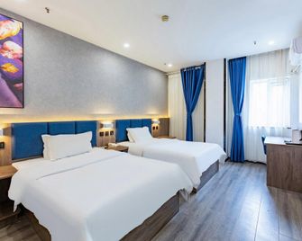 7 Days Premium Hotel (Shijiazhuang Donggang Road Dashimen) - Shijiazhuang - Habitación