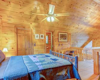 Dog-friendly cabin w/ private hot tub, mountain views, two fireplaces, ping-pong - Mineral Bluff - Bedroom