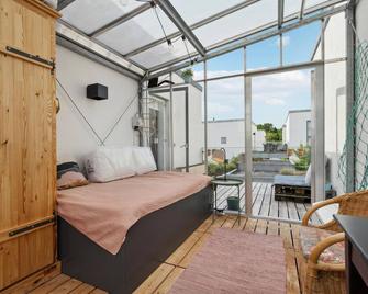 Spend a wonderful vacation in this inviting apartment near the beach. - Christiansbjerg - Sala de estar