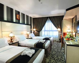 Zowar International Hotel - Medine - Yatak Odası