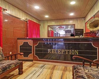 Hilltown Hotel - Madikeri - Front desk