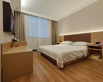 Greentree Inn Shanxi Jinzhong Jiexiu Railway Station Express Hotel - Jinzhong - Quarto