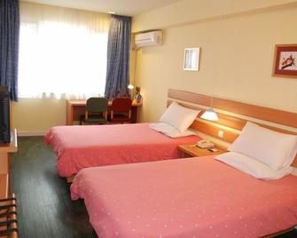 Home Inn Hubin South Road - Xiamen - Xiamen - Schlafzimmer