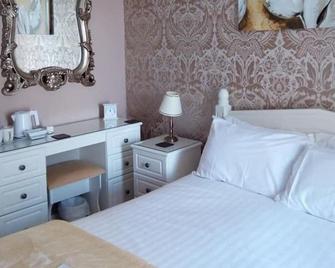 إنشري بد آند بركفاست - إينفيرنيس - غرفة نوم