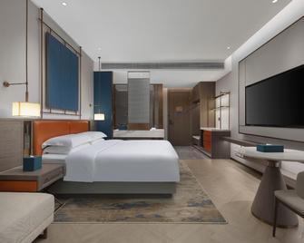 Days Hotel by Wyndham Jingzhou Jinlong - Jingzhou - Спальня