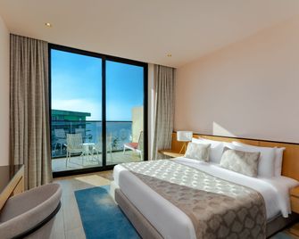 voco Dubai Monaco Heart of Europe by IHG - Dubái - Habitación