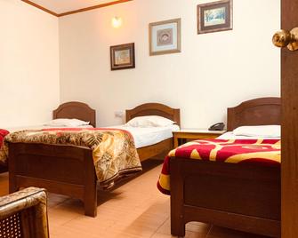 Hotel Devika - Dibrugarh - Bedroom