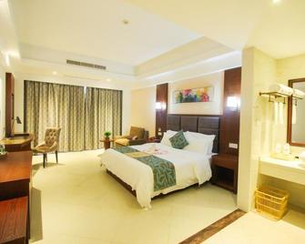 Qionghai Jin Mao Hotel - Qionghai - Bedroom