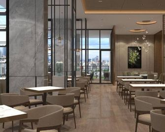 Harris Hotel & Suites Nagoya Batam - Batam - Restaurant