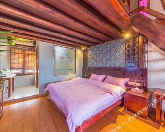 Huayuge Inn - Lijiang - Camera da letto