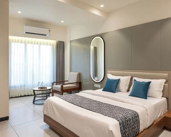 The Zuree Hotel - Gandhinagar - Slaapkamer