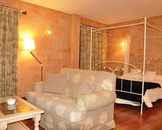 Hotel Rural Carlos I - Garganta la Olla - Sala de estar
