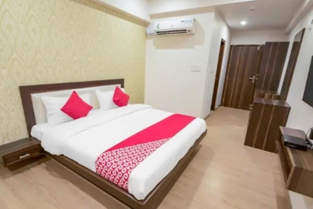 Hotel Sarvmangla Garden - ג'איפור - חדר שינה