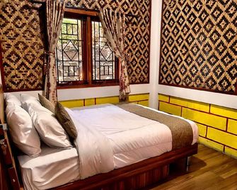 Qions Villa Resort Lembang - Lembang - Schlafzimmer