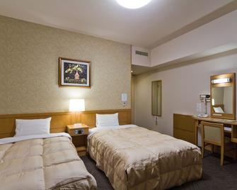 Hotel Route-Inn Tomakomai Ekimae - Tomakomai - Bedroom