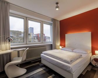 سيتي هوتل مونوبول - هامبورغ - غرفة نوم