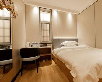 Greentree Inn Hebei Zhangjiakou Public Security Plaza Express Hotel - Zhangjiakou - Camera da letto