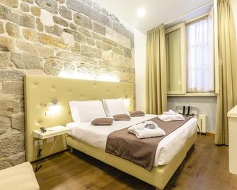 Hotel Ilaria - Lucca - Schlafzimmer