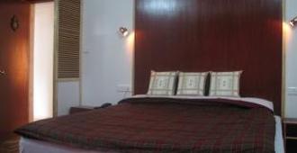 Holiday Plaza Hotel - Srinagar - Bedroom