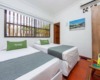 Hotel Ayenda Casa Cano 1805 - Cartagena - Bedroom