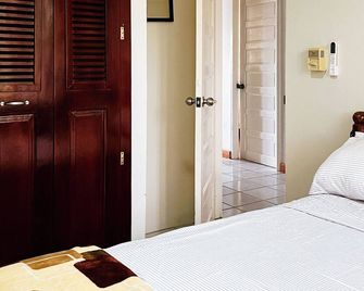 Capital Escape - Charming bungalow with WiFi & AC - Belmopan - Chambre
