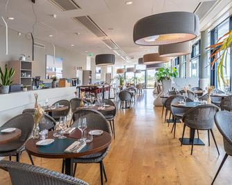 أكواتيس هوتل - لوزان - مطعم