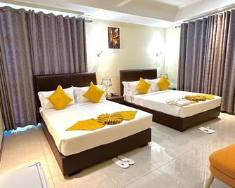 KIjichi gateway Hotel - Daressalam - Schlafzimmer