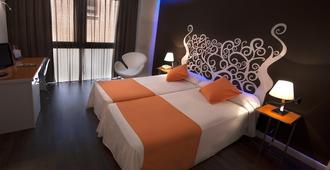 Hotel Teruel Plaza - Teruel - Schlafzimmer