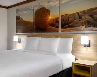 Days Inn by Wyndham Suites Fredericksburg - Fredericksburg - Schlafzimmer