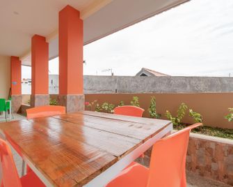 RedDoorz Syariah @ Panglima Polem Aceh - Banda Atjeh - Balkon